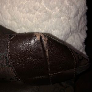 Brown Gucci tote bag.